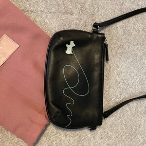 Black Leather Clutch with Unique Design